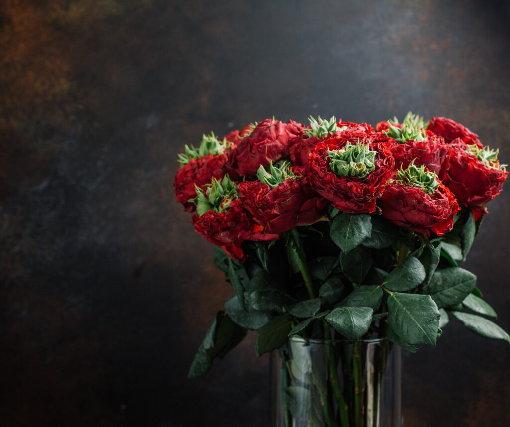 Red and white floral arrangements for funeral